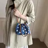 Bolsa pequena de bolinhas popular deste ano para mulheres 2026 nova bolsa transversal estilosa e versátil bolsa de saco requintada com cordão atacado