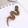 Broche de serpiente vintage de diamantes Moda europea y americana Accesorios para abrigo y traje Corsage de alta calidad Venta al por mayor La parte posterior se puede cambiar Hebilla de zapato