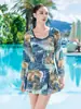 Novo maiô de manga comprida com proteção solar para mulheres, um modelo elegante e modelador estilo vestido de peça única que cobre a barriga, disponível em tamanhos grandes, perfeito para águas termais, natação e um look de resort.