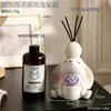 Ornamento aromático em formato de coelho de orelhas caídas segurando uma flor com porta-velas, adequado para quarto, escrivaninha e decoração de casa, criando uma atmosfera aconchegante, uma ótima decoração de presente para casa