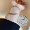 Pulsera de Acero de Titanio con Trébol de Cuatro Hojas en Todo el Diseño, Popular de Venta Caliente Transfronteriza para Niñas, Cuerda Roja, Exquisita, Lujo Ligero, Gama Alta, No se Desvanece, Joyería de Mano