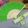 Comercio electrónico transfronterizo abanico femenino elegante más vendido 21cm abanico de boda abanico femenino caja hueca 14 colores opcionales