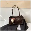 Bolsa Retrô Fashion de Grande Capacidade Feminina 2026 Nova Bolsa de Ombro para o Dia a Dia Bolsa Tote de Mão com Alta Estética de Letras