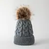 Gorro de otoño e invierno para niños, gorro de lana gruesa con bola de pelo grande para mujer, gorro de punto de lana trenzada a la moda para todo tipo de combinaciones.