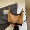 Bolso cruzado para el día a día Gran capacidad Moda para mujer Versátil Retro Casual Bolso de hombro Bolso de cadena para la axila Comercio exterior transfronterizo