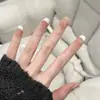 Armadura de mano sentido avanzado hecho a mano ins explosiones diamante roto mariposa uña piezas de uña al por mayor uñas portátiles
