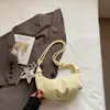 Bolsa de Axila Texturizada Nicho Estilo Coreano Feminina 2025 Nova Simples Casual Moda Ombro Cruzado Bolsa Croissant