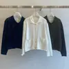 Enviado: Cardigan de outono novo, chique coreano, doce, com trança vazada, suéter de tricô casual solto feminino 19924
