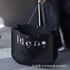 Bolsa de Hombro Nueva Estilo No Tejida, Bolsa Cuadrada y Redonda, Logo Personalizado, Bolsa de Hombro para Tienda de Ropa, Bolsa de Luna Universal para Centros Comerciales