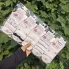 Meias Casuais Femininas Longyixiang de Cano Médio Brancas Fofas Versáteis de Algodão Branco Estilo College 26 Novo Modelo Outono/Inverno