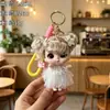 Llavero de muñeca de vinilo con pelo rizado, moderno y elegante, figura de dibujos animados exquisita y linda, colgante para mochila, pequeño regalo