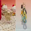 Colgante de oro de perro canela 999 de oro puro, cordón de oso violento serie Sanrio, regalo promocional de tienda de oro