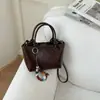 Bolso de mano popular transfronterizo para mujer, nuevo, retro, de alto valor, tipo cubo, tendencia de moda, temperamento, bandolera simple, cruzado