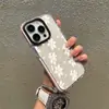 Funda de Teléfono Blanca Flor de Lirio Más Vendida Europea y Americana iPhone17 Borde Negro Apple 16Pro Funda de Teléfono Transparente