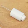 Loción Descuento para el Cuidado de la Piel Botella con Gotero Grano de Madera Anillo Dorado y Plateado Gotero Botella de Esencia Botella Transparente Mate Muestra Líquida