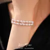 Pulsera de doble hilo estilo vintage francés con estrella de circonita cúbica y perlas, una pieza de joyería lujosa y elegante, un accesorio delicado y versátil para mujeres