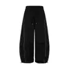 Pantalones Deportivos Negros de Secado Rápido Estilo Americano para Hombres y Mujeres con Rayas Laterales Reflectantes, Puños con Cordón, Pantalones de Jazz de Pierna Ancha Plisados