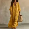 Ropa de mujer transfronteriza europea y americana 2026: Vestido largo casual suelto cómodo para el día a día, vestido de cuello en V estilo socialité para uso privado
