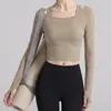 Venta al por mayor de ropa de yoga transfronteriza: Blusas de manga larga para mujer para primavera, verano y otoño, diseñadas para estilizar y adecuadas para Pilates y fitness, disponibles para envío directo