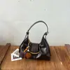 Bolso bandolera 2026 Otoño Nuevo Gran Capacidad para el Trabajo Bolso de Hombro para Mujer Sentido de Alta Gama Bolso de Hombro Único Bolso de Mano con Sentido de Diseño de Nicho