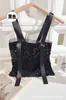 Moda de chica atrevida sexy top sin mangas tipo camisola de lentejuelas con copas ajustado versátil cómodo para usar como prenda exterior corto cruzado sin tirantes en el pecho