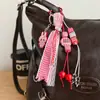 Rojo extremadamente numeroso miu lazo encaje bolsa bolsa colgante cadena llavero colgante para enviar a amigos elección colorida
