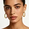 Pendientes Ovalados Redondos con Textura Ins Niche Europeos y Americanos, Pendientes Irregulares Femeninos, Venta al por Mayor Transfronteriza