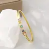Distrito de Lu Pulseira de Cobre Colorida com Zircônia Inlaid Cruzada Feminina Estilo Ins Nicho Europeu e Americano Pulseira de Design Avançado Atacado