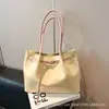 Bolso de Mano de Lujo Ligero y de Gama Alta para Mujer Modelo Nuevo 2026 Gran Capacidad Bolso de Hombro para el Trabajo Bolso Tote Casual de Moda Tendencia