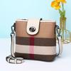 Atacado de fábrica bolsa feminina 2024 nova coreana fivela xadrez bolsa balde feminina transfronteiriça bolsa de ombro mensageiro moda
