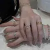 Anillo único de cielo estrellado dorado estilo vintage, versátil para el uso diario, anillo de diamante para mujer con pentagrama de lluvia de meteoros