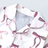 Conjunto de Pijama Cardigan Rosa de Seda Leite Transfronteiriço Europeu e Americano para Mulheres, Shorts de Manga Curta, Roupa de Casa Confortável e Respirável Conjunto Casual