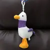 Desenho animado transfronteiriço coreano fofo pato abastecendo acessórios de pelúcia desenhos animados bolsas de casal enfeites pendurados Coringa pequenos presentes atacado