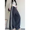 Pantalones deportivos de diseño retro a rayas para principios de otoño con paneles de color contrastante, pantalones de cintura alta de pierna curva, pantalones deportivos casuales holgados y versátiles de pierna ancha