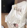 Modelo nuevo 2026, súper elegante, ligero, camiseta de manga larga de algodón puro para mujeres de talla grande, corte holgado, con un diseño único