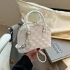 Bolsa Feminina Textura Moderna Comércio Exterior 2026 Nova Xadrez Concha Versátil Ombro Único Sobrancelha Bolsa de Mão para Senhoras