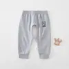 Pantalones de bebé estilo primavera y otoño ropa exterior para niños y niñas pantalones de entrepierna abierta para bebés y niños pequeños pantalones largos de algodón puro clase A pantalones de otoño separados