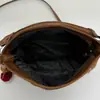 Versátil Bolso para Mujer de Nuevo Diseño de Moda Europeo y Americano Texturizado Remache Motocicleta Nicho Hueco Bolso Portátil de Hombro Cruzado