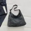 Bolso grande de mezclilla para mujer, nuevo diseño de moda 2026, bolso de hombro cruzado retro simple, bolso tote casual para el día a día