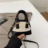 2025 Nueva Linda Bolsa Cruzada de Viaje para Niñas Estilo Infantil Diseño de Nicho Cartera Casual para Monedas Bolsa de Concha