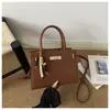 Comercio exterior casual retro ropa de trabajo 2026 lujo ligero colgante de PU bolso simple chic bandolera cruzada para mujer