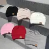 Gorro de punto para coleta de otoño e invierno al por mayor gorro de lana cálido con terciopelo venta directa gorro de luna simple para mujer gorro de cúpula