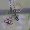 Chaveiros de panda mais vendidos transfronteiriços, pingentes de bolsa de desenho animado fofos, pequenos presentes criativos de metal, atacado