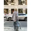 Primavera 2025 Retro Americano Rasgado Graffiti Scimitar Jeans Unisex Holgados de Pierna Ancha Pantalones Tendencia