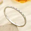 Ins Celebridade da Internet Estilo Quente Aço Inoxidável Cor 18K Preservadora de Cor Fivela de Sete Diamantes Pulseira Pulseira Joias Femininas de Alta Qualidade Preservadoras de Cor