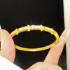 Pulsera con cierre de circonita chapada en oro real de 18K, finamente elaborada, lujo ligero, sensación de alta gama, versátil para el uso diario, realza el temperamento de uno.