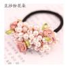 Versión coreana del anillo de pelo de cristal de perla para damas, banda de goma con cuentas de flores y hojas verdes, pequeña y fresca, cuerda para la cabeza de alto sentido para mujeres, venta al por mayor