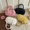 Bolsa tipo almohada de comercio exterior transfronteriza para mujer, estilo coreano, moderna y simple, bolso de mano de un solo hombro, bolso cruzado de nicho de alta gama para el día a día