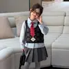 Fuguo Niñas 2026 Otoño Nuevo Suéter Patrón de Diamantes Tejido Chaleco Infantil Sin Mangas Cárdigan Ropa de Hilo