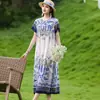 Elegante y moderno vestido de noche de algodón y seda de verano nuevo para madres de mediana edad y mayores, elegante vestido casual holgado para el hogar para mujer